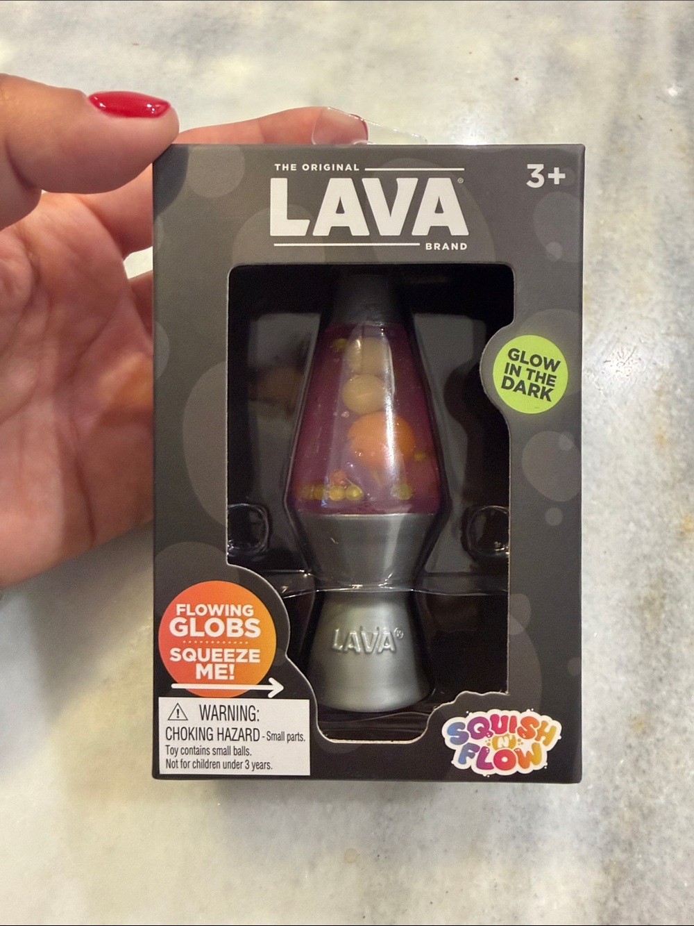 Schylling The Original LAVA Glow-in-the-Dark Squish & Flow Mini Lava Lamp